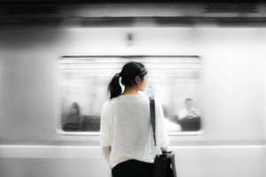 woman waiting for subway