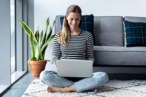 woman receiving a virtual hypnosis and Distance Reiki session