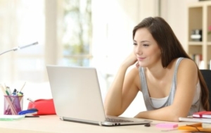 woman learning self reiki online