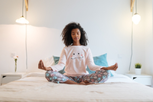 woman meditating before distance healing session