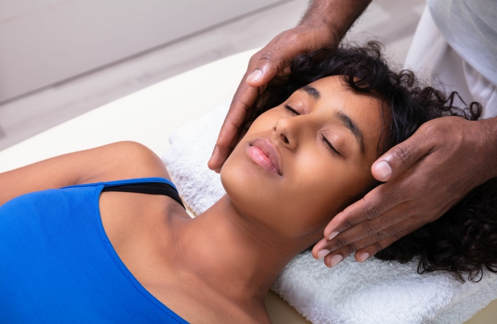 woman receiving a reiki session