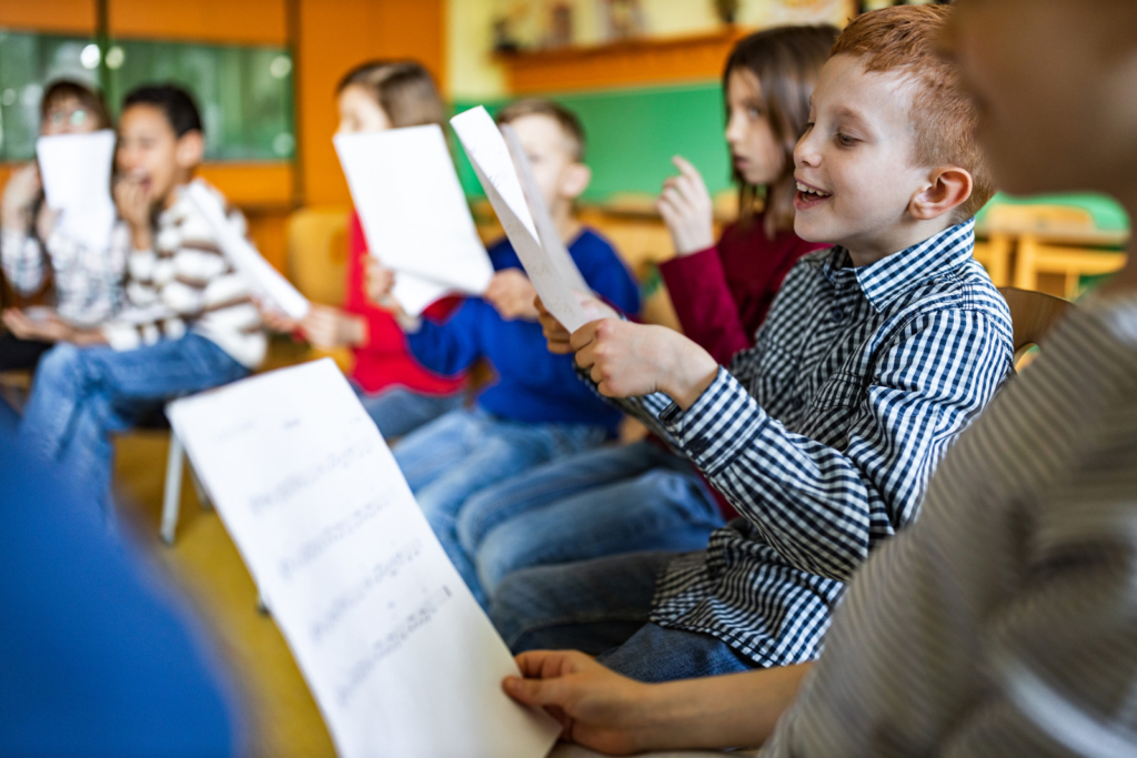 students singing in elementary school