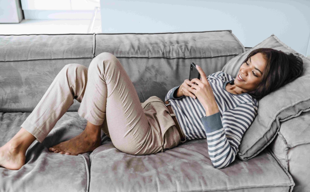 woman receiving a distance reiki session in the comfort of her own home