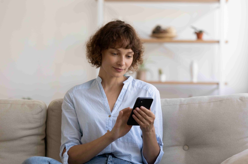 woman having an online Hypnosis session at home