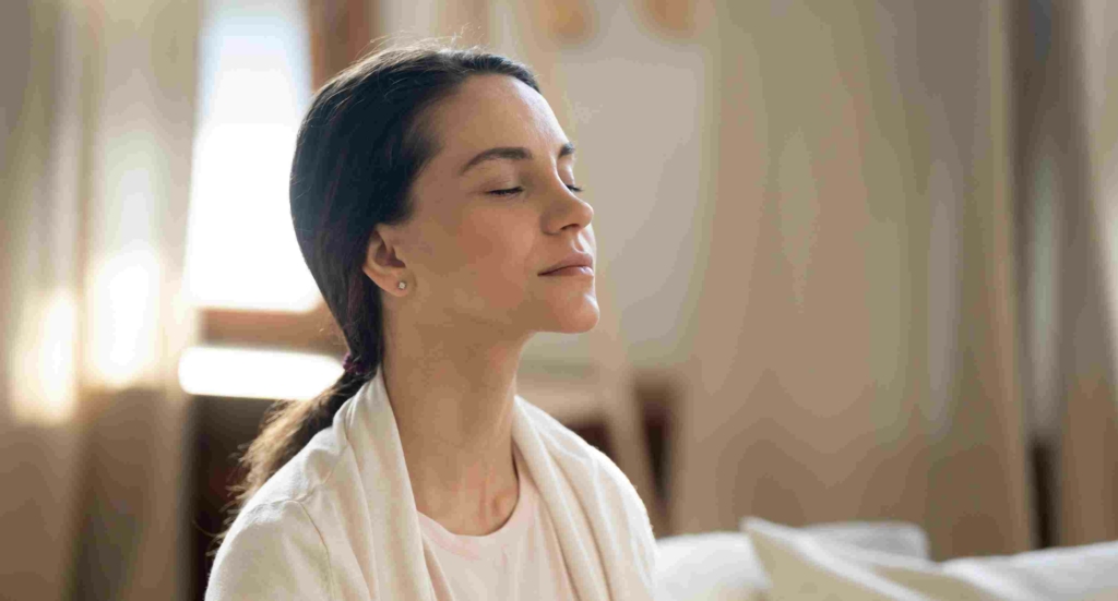 woman receiving a Kuan Yin Quantum Healing blessing