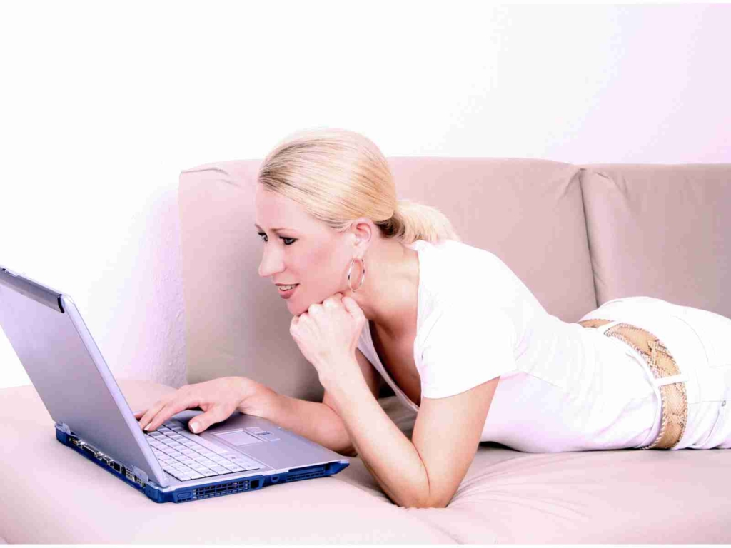 woman on laptop participating in Soul Healing Events