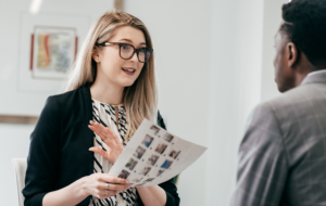 woman giving a presentation at work